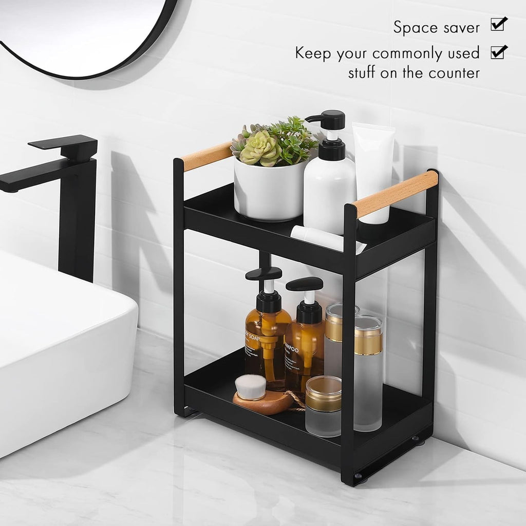 GoHooked black metal 2-tier standing rack with wood handles, holding bathroom toiletries and cosmetics.