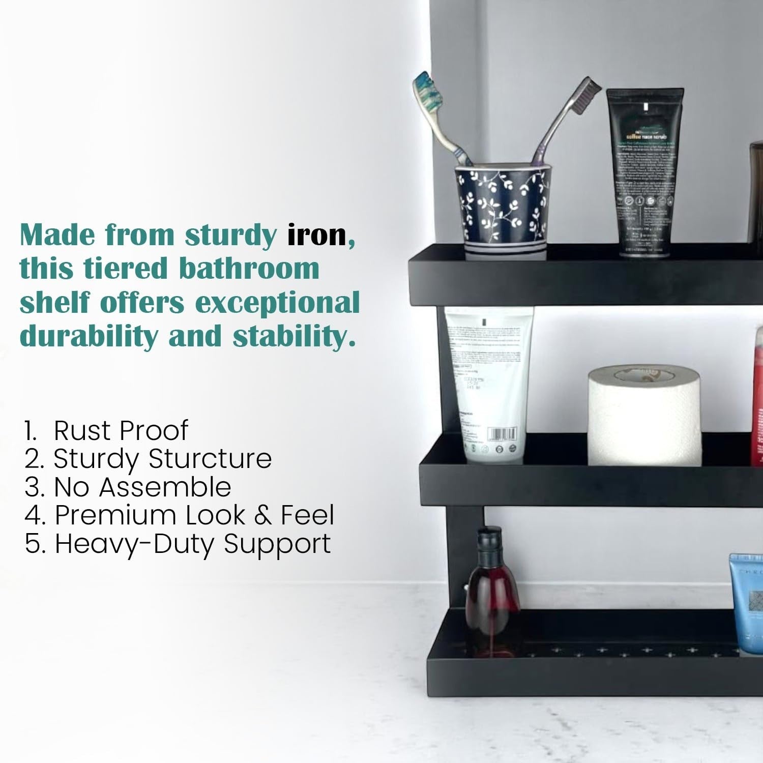 GoHooked black metal 3-tier bathroom shelf rack organizer holding toiletries, toilet paper, and toothbrushes.
