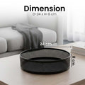 Go Hooked black metal revolving fruit basket with a perforated mesh design, 24cm diameter, 8cm height.