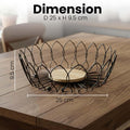 Go Hooked black metal wire fruit basket with wooden base, 25cm diameter, 9.5cm height. Open design for airflow.
