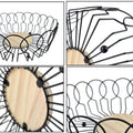 Go Hooked black metal wire fruit basket with a natural wood base, featuring an open design for airflow. Modern home decor.