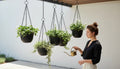 GoHooked 12-inch black metal hanging plant chains, set of 5, for outdoor decor.