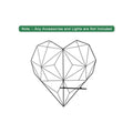 GoHooked black metal heart-shaped wall grid with shelf for photos and keepsakes. Geometric design.