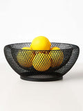 GoHooked black double-layer metal mesh fruit bowl holding fresh yellow lemons on a white background