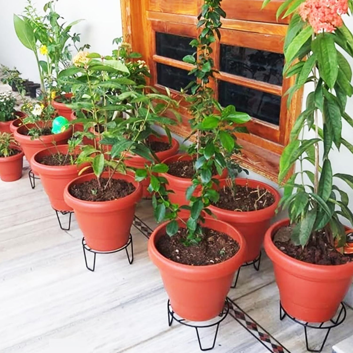 GoHooked black metal plant pot stands, pack of 3, sturdy, rust-proof, for indoor/outdoor use.