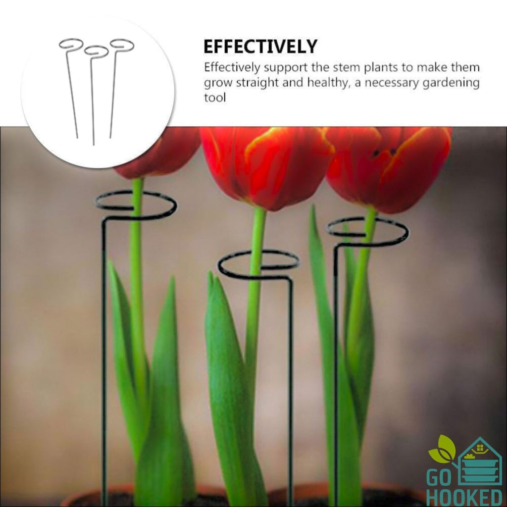 GoHooked 16-inch black powder-coated steel plant stakes supporting red tulips in a garden pot