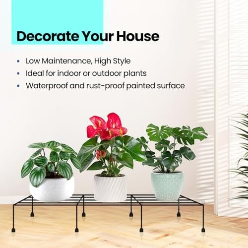 GoHooked black metal rectangular plant stand, 24 inch, for indoor/outdoor use, holding three potted plants.