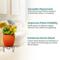 GoHooked black metal plant stand holding an orange pot with a green plant, perfect for balconies and living rooms.