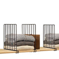 Go Hooked black metal shelf dividers organizing folded sweaters and a brown bag on a wooden shelf.