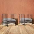 GoHooked black metal shelf dividers organize folded clothes and bags on a wooden shelf.