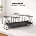 GoHooked black metal sink organizer with auto-drain design, 28cm wide, for dish soap, sponges, and brushes.