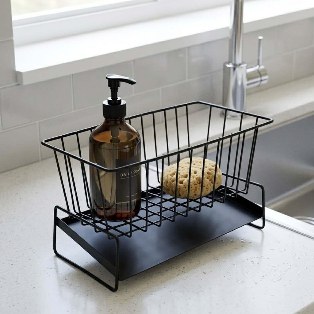 GoHooked black metal sink organizer with auto-drain design, holding dish soap and sponge.