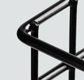 GoHooked black metal wall mounted storage basket with hooks, no-drill adhesive shelf for bathroom organization.