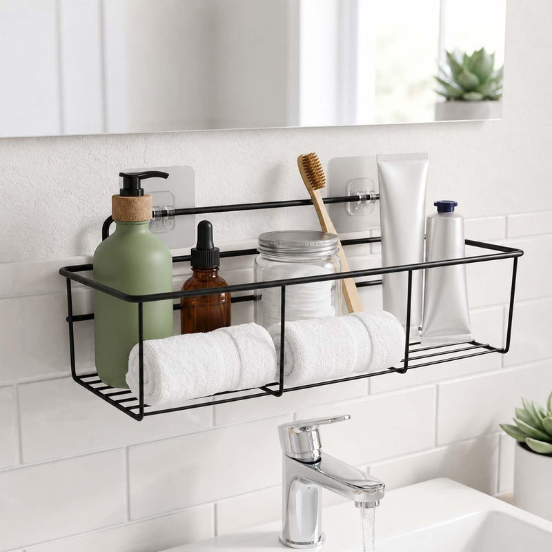 GoHooked black metal wall-mounted storage basket with adhesive hooks holding toiletries and towels.