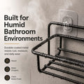 GoHooked black metal wall mounted storage basket with adhesive hooks, ideal for humid bathrooms.