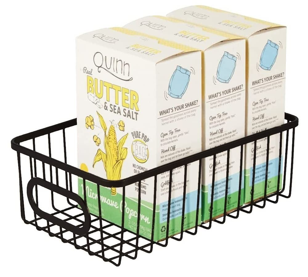 GoHooked black metal wire grid storage basket bin with handles, holding three boxes of microwave popcorn.