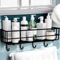Go Hooked black metal wall mounted storage basket with hooks, holding various bottles and jars. Ideal for bathroom organization.