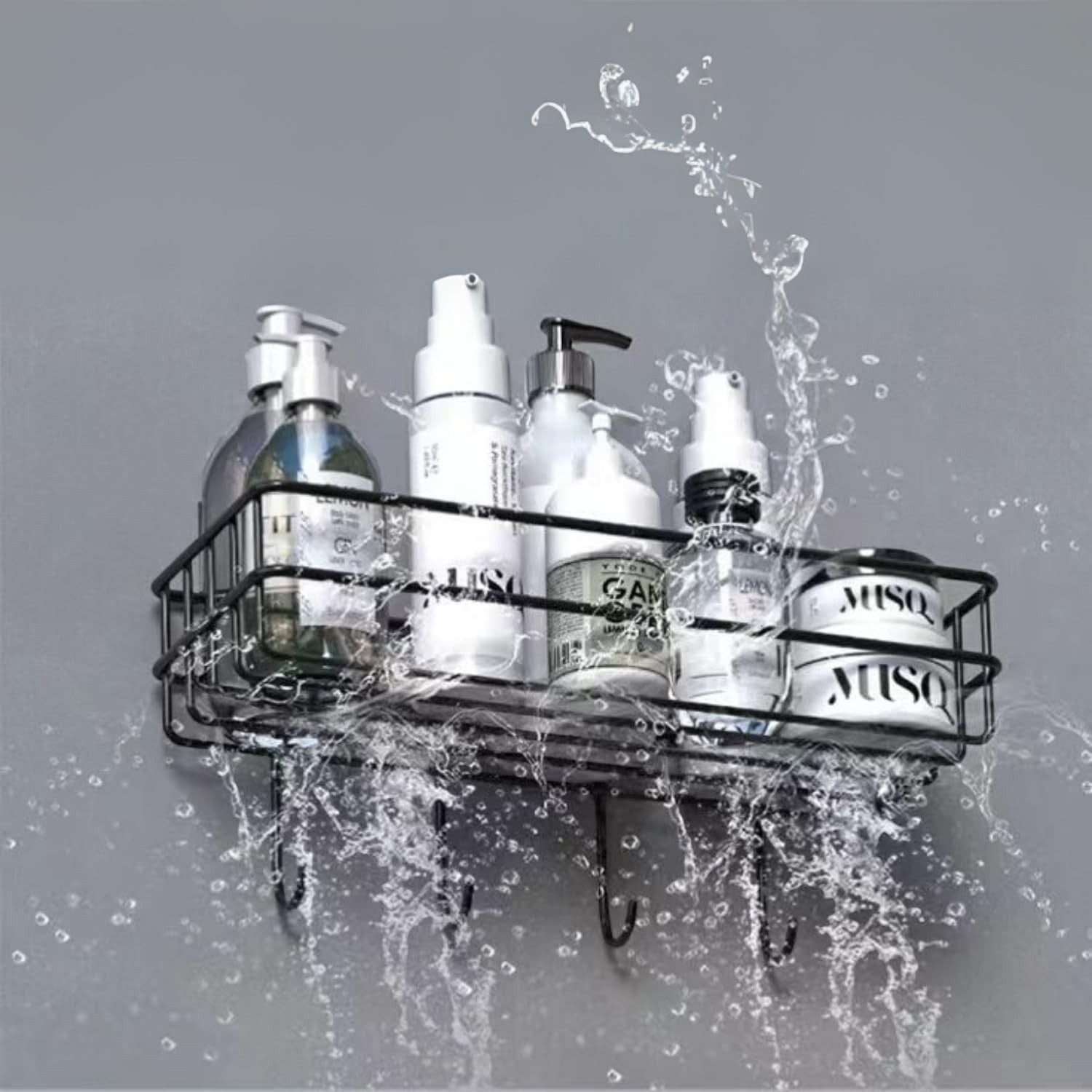 GoHooked black metal wall-mounted storage basket with hooks, holding toiletries and water splashing.