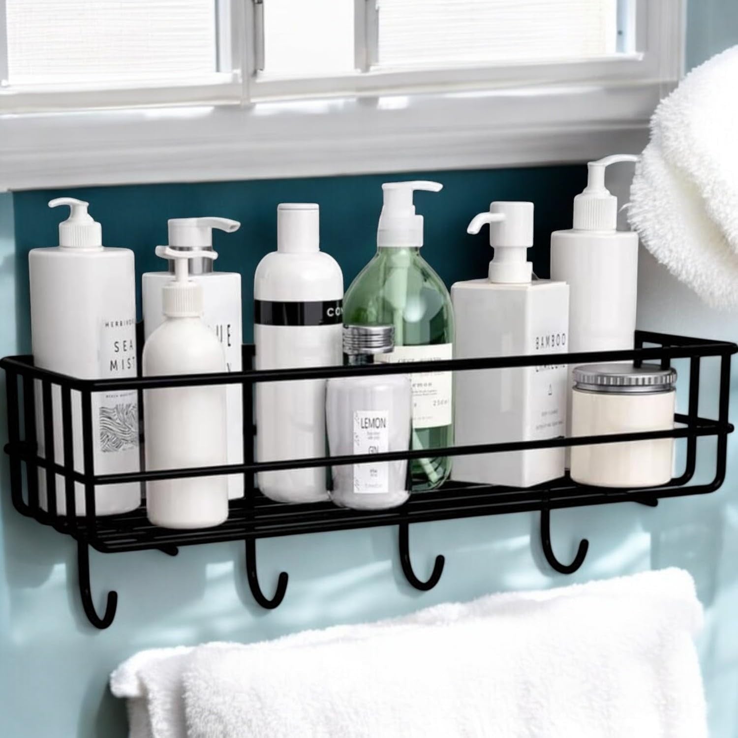 GoHooked black metal wall-mounted storage basket with hooks, ideal for bathroom organization. Holds bottles and jars.