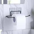 Go Hooked black metal self-adhesive toilet paper holder with a roll of toilet paper attached.