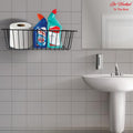 GoHooked black metal wall mount basket holding toilet paper and cleaning supplies in a bathroom.