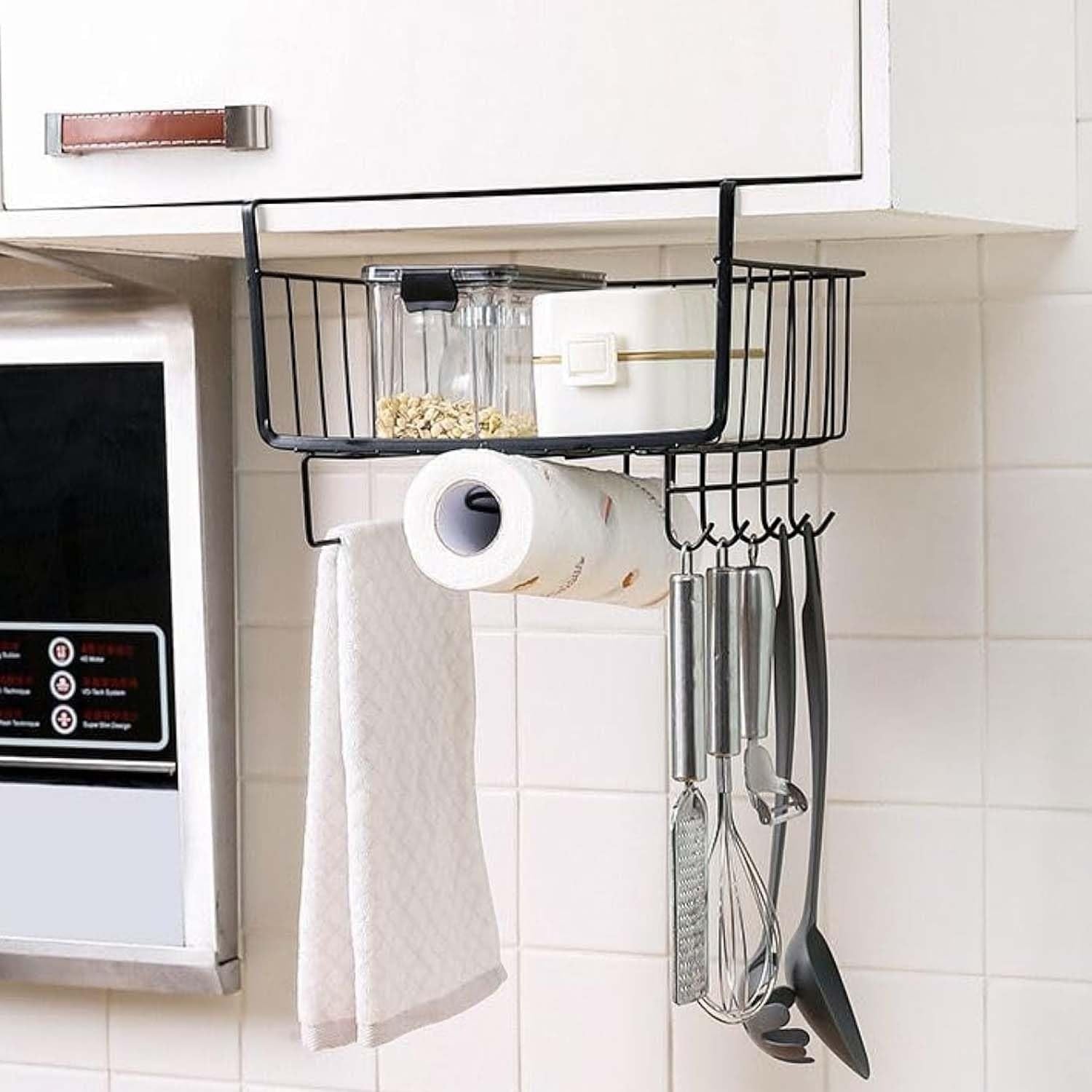 GoHooked black metal wire under shelf basket organizer with hooks holding kitchen utensils and paper towel roll.