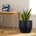 GoHooked Pluto 24-inch black polymer planter pot with snake plant, modern round design for living room or office.