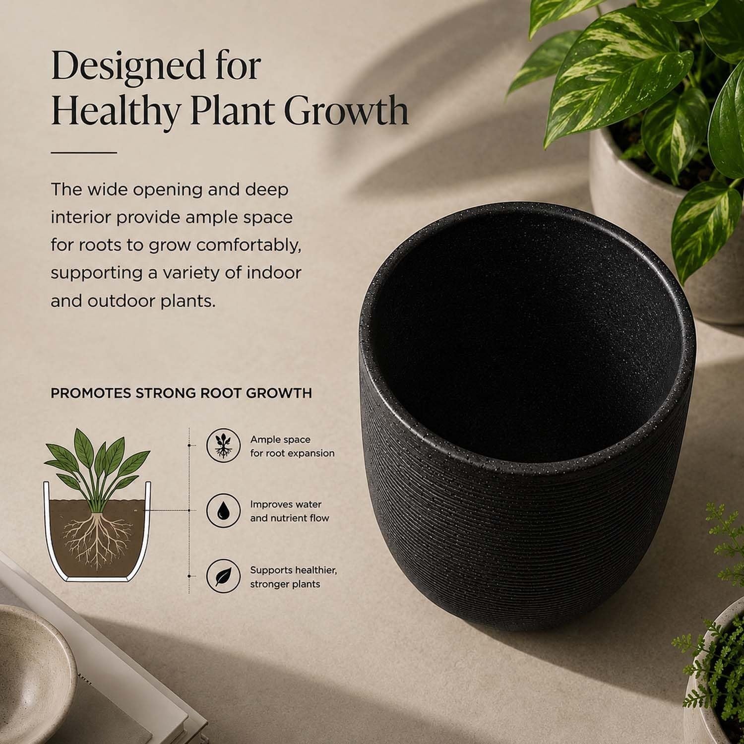 GoHooked 10-inch black polymer planter pot with textured finish, designed for healthy plant growth indoors or outdoors.