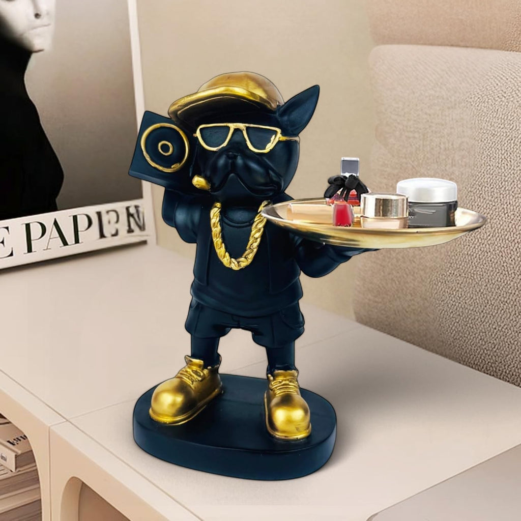 GoHooked black polyresin rapper bulldog statue holding a gold tray with makeup and jewelry. Features gold accents.