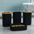 GoHooked black ribbed bathroom accessories set with soap dispenser, toothbrush holder, tumbler, and soap dish.