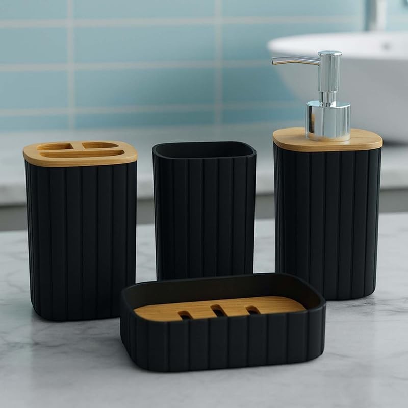 GoHooked black ribbed bathroom accessories set with soap dispenser, toothbrush holder, tumbler, and soap dish.