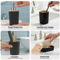 GoHooked black ribbed bathroom accessory set with soap dispenser, toothbrush holder, tumbler, and soap dish.