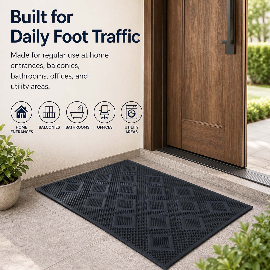 GoHooked black rubber door mat with a textured diamond pattern placed at a home entrance for daily foot traffic.
