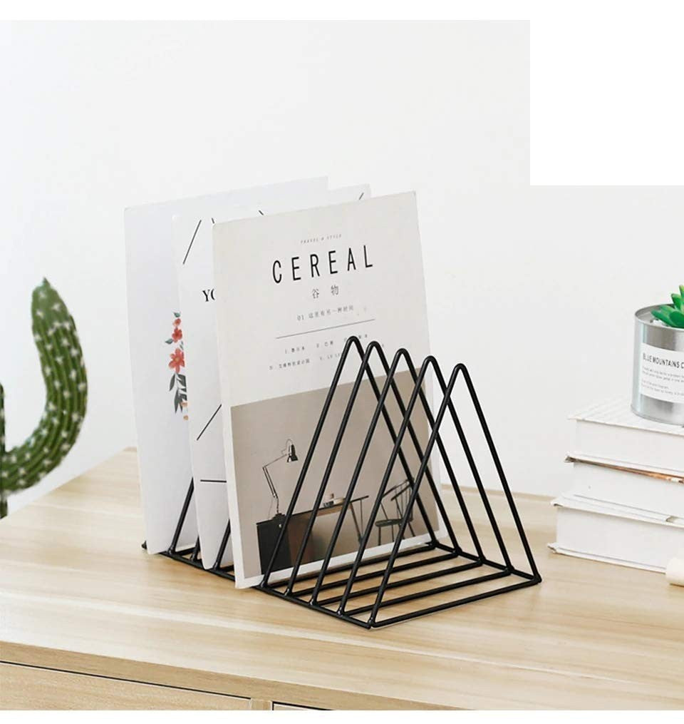 GoHooked black coated steel triangular magazine rack holding books and magazines on a wooden desk.