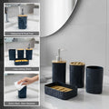 GoHooked black textured plastic bathroom accessory set with soap dispenser, toothbrush holder, tumbler, and soap dish.