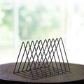 GoHooked black triangular coated steel magazine rack with 9 slots for organizing books and newspapers.