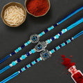 GoHooked set of 3 blue beaded rakhis with evil eye and hamsa charms. Includes roli and chawal.
