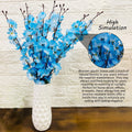 Go Hooked artificial blue blossom flowers in a white textured plastic vase, perfect for home or office decor.