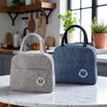 Go Hooked pack of 2 blue and grey insulated lunch bags made of Oxford cloth with thermal lining and zipper closure.