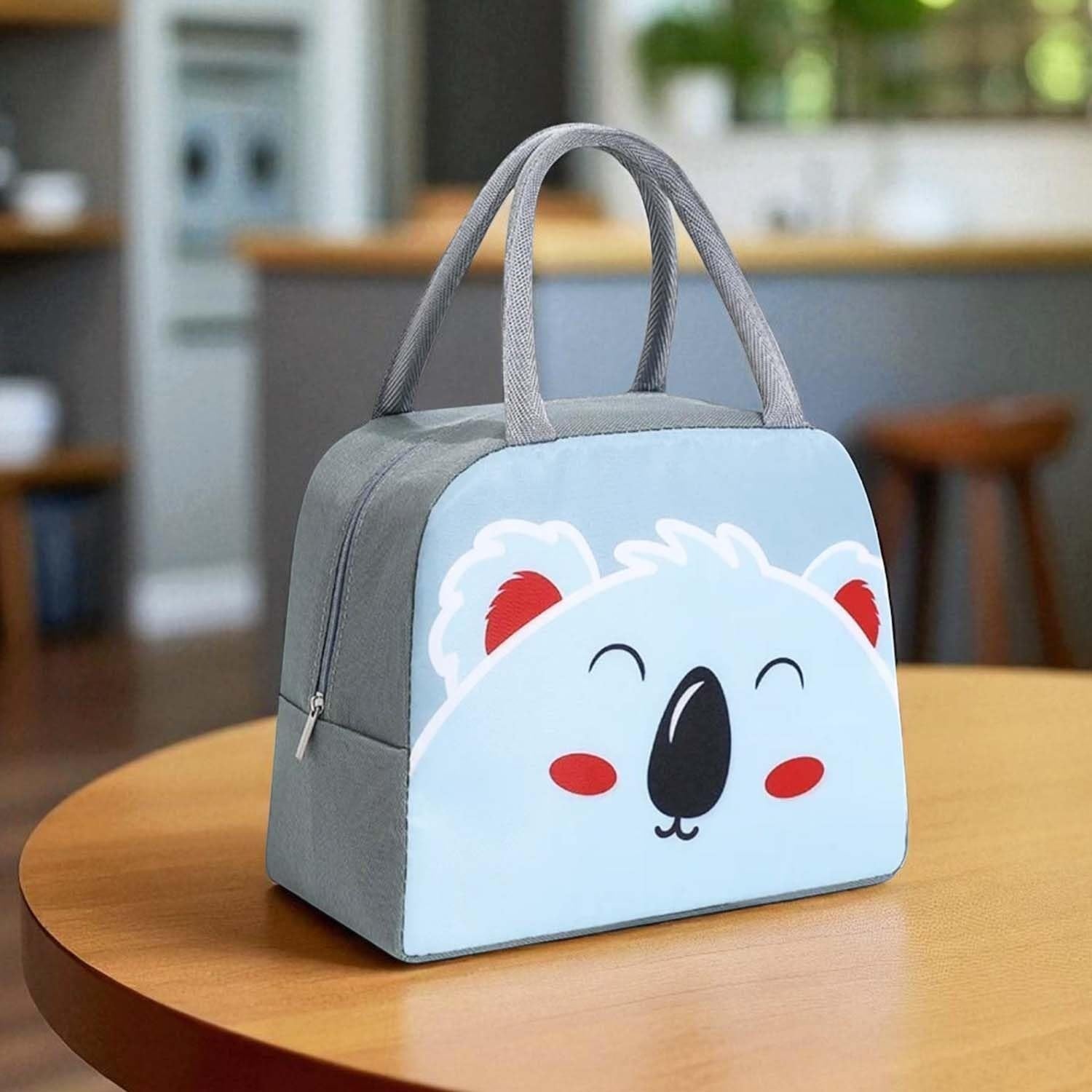 Go Hooked blue Oxford cloth lunch bag with a cute winky koala face design, thermal insulated for kids.