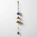 GoHooked blue monk figurine wind chime with brass bells and heart charm, metal, for positive energy and home decor.
