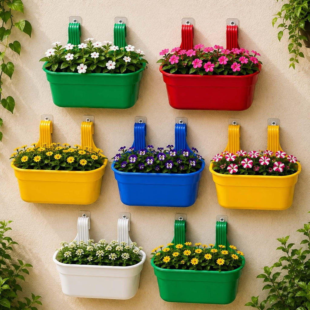 GoHooked set of 3 blue rectangular plastic railing hanging planters filled with flowers.