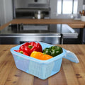 GoHooked blue plastic storage basket with zip net cover, filled with red, green, and yellow bell peppers.