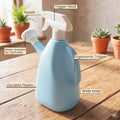 GoHooked blue plastic 1L watering can with spray bottle nozzle and ergonomic trigger for indoor plants.
