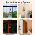 GoHooked brown metal Feng Shui monk figurine wind chime with 3 brass bells, perfect for positive energy and home decor.