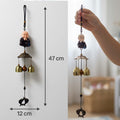GoHooked brown metal Feng Shui monk figurine wind chime with brass bells, 47cm long.