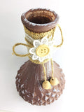 Go Hooked brown painted glass flower vase with jute and lace trim, featuring a button flower accent.