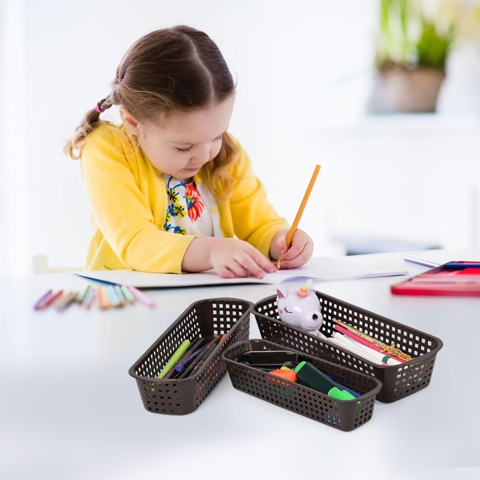Go Hooked brown plastic drawer organizer set of 3, holding art supplies and a unicorn coin bank.
