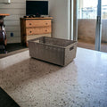 Go Hooked brown plastic storage basket with perforated sides and handles, ideal for cosmetics, office supplies, or fruit.