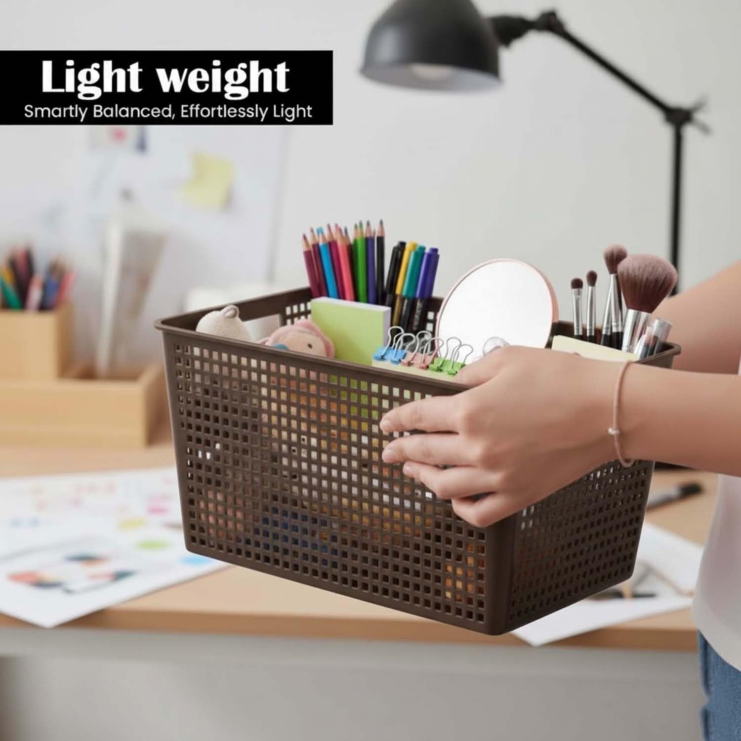 GoHooked brown plastic storage bin with a grid pattern, holding pencils, brushes, and a mirror.